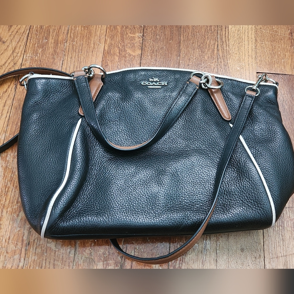 Black and brown leather coach purse